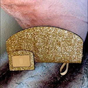 matching gold wristlet/ID card